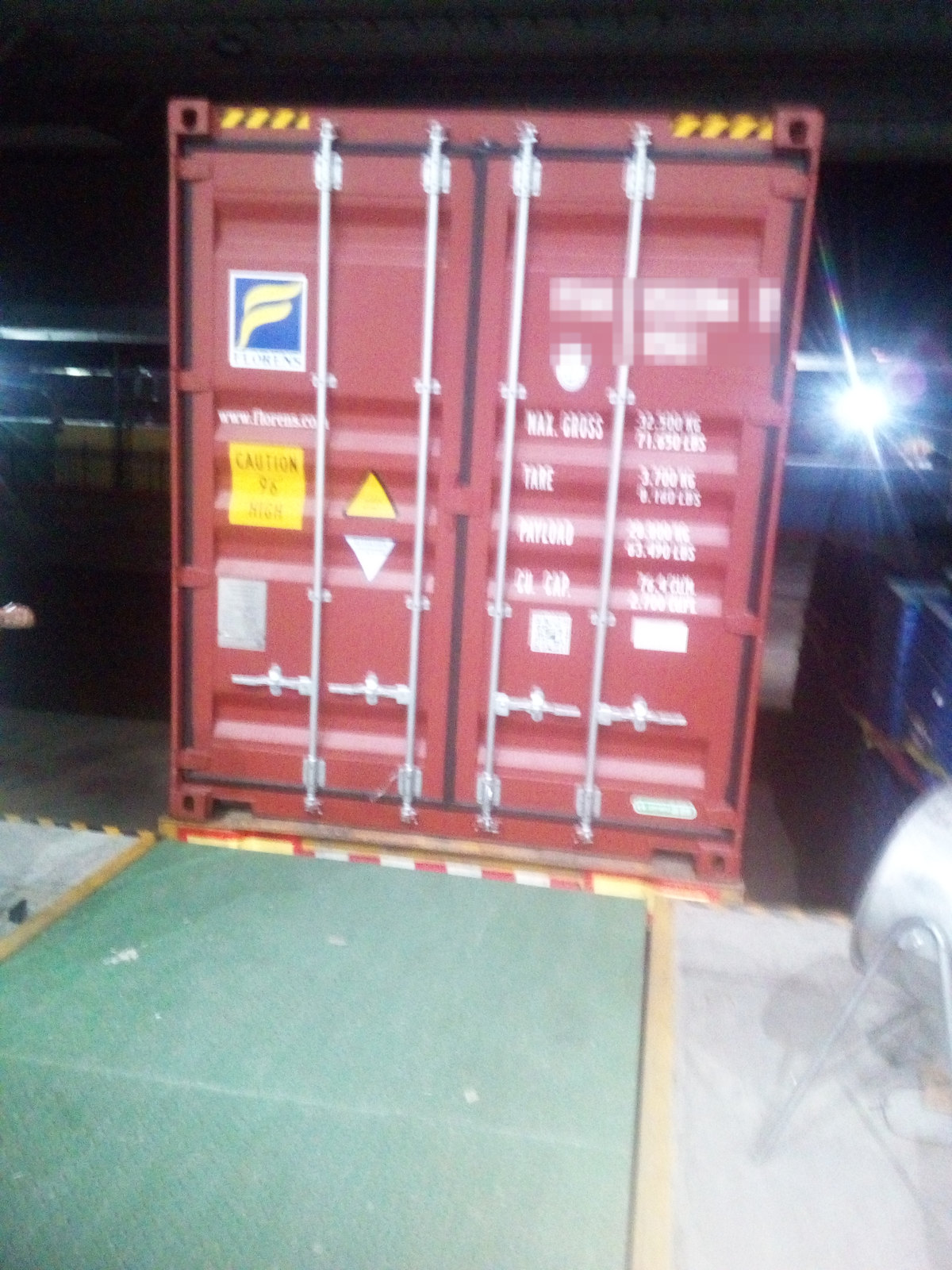 Closed and sealed container doors with the capacity plate visible