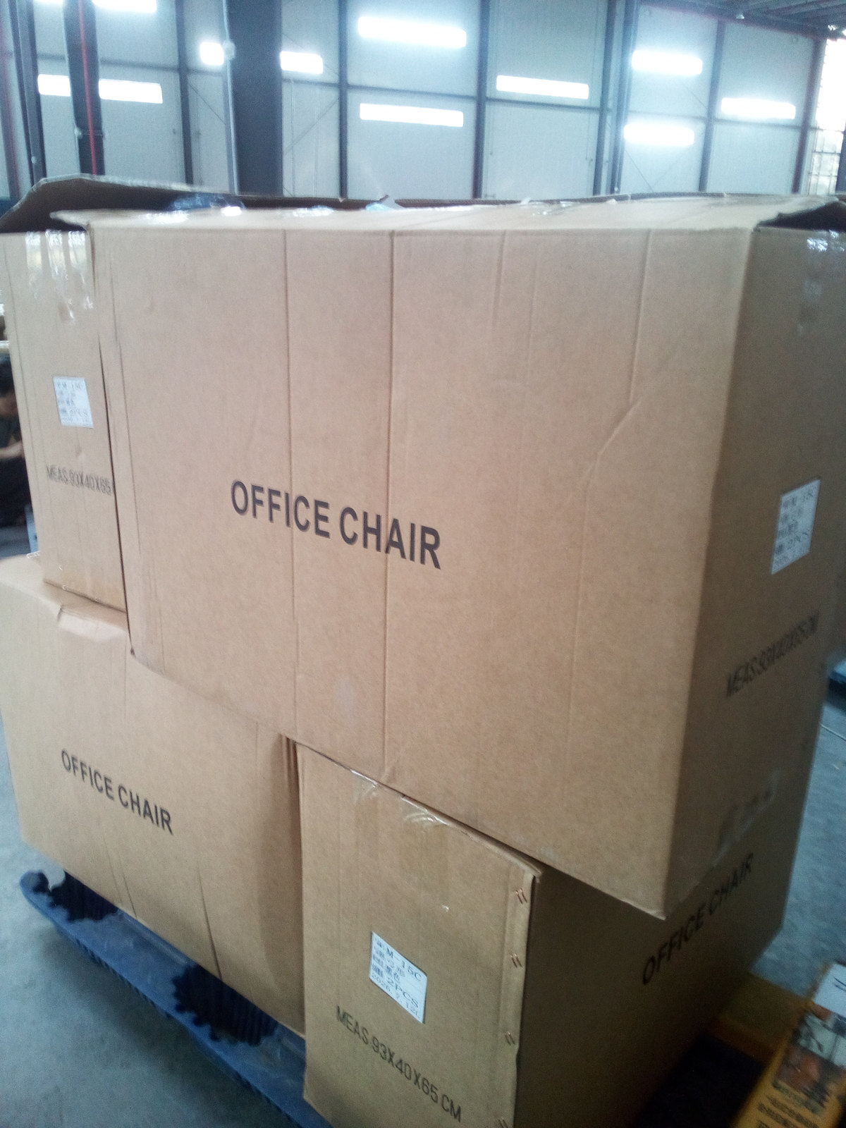 Office chair with a bow-leg base as received — shipping record SR-2026-063